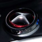 Kontio Autokruiser -sähkömopoauton ohjauspyörän logo